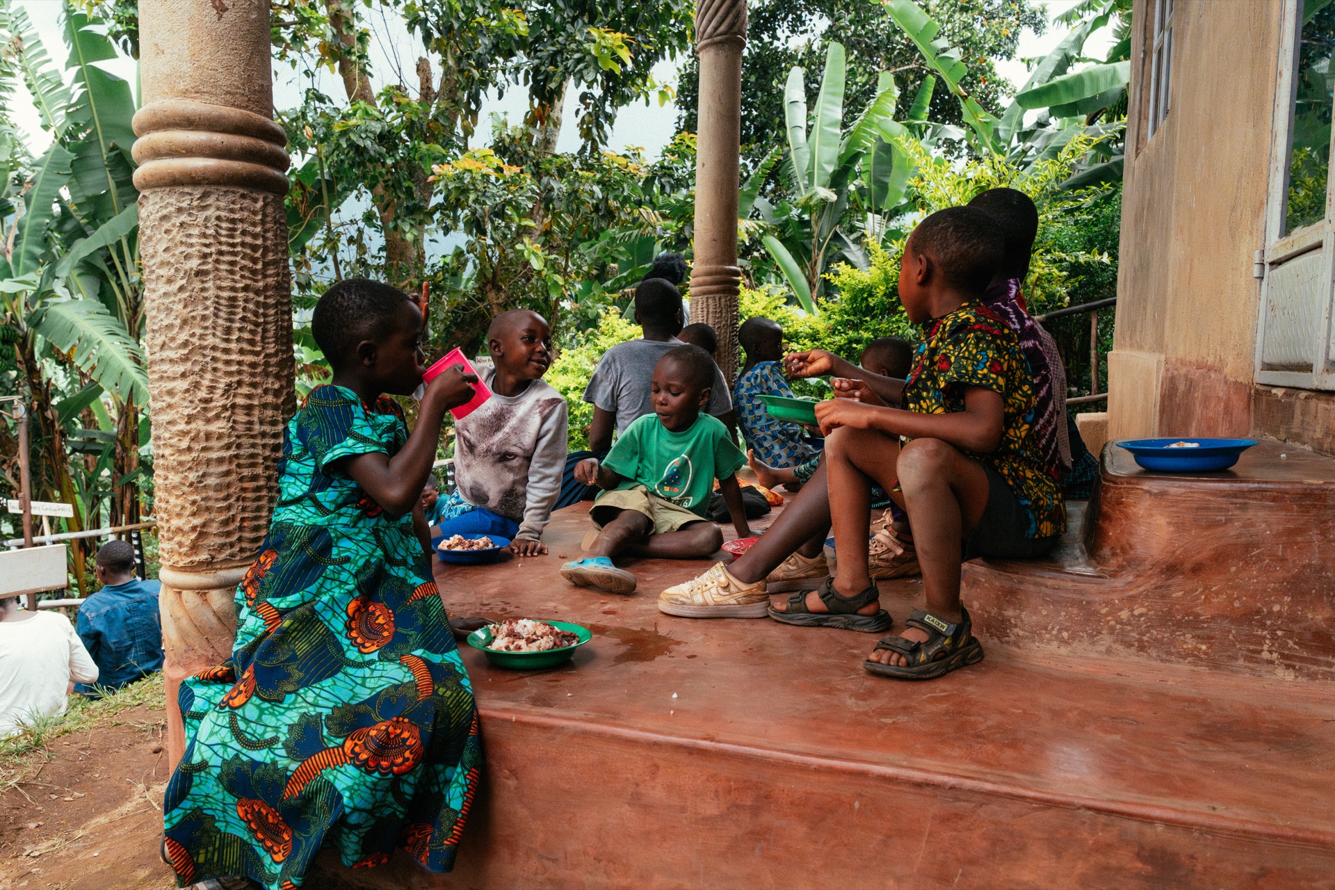 Children eating a meal together at HopeKitchen