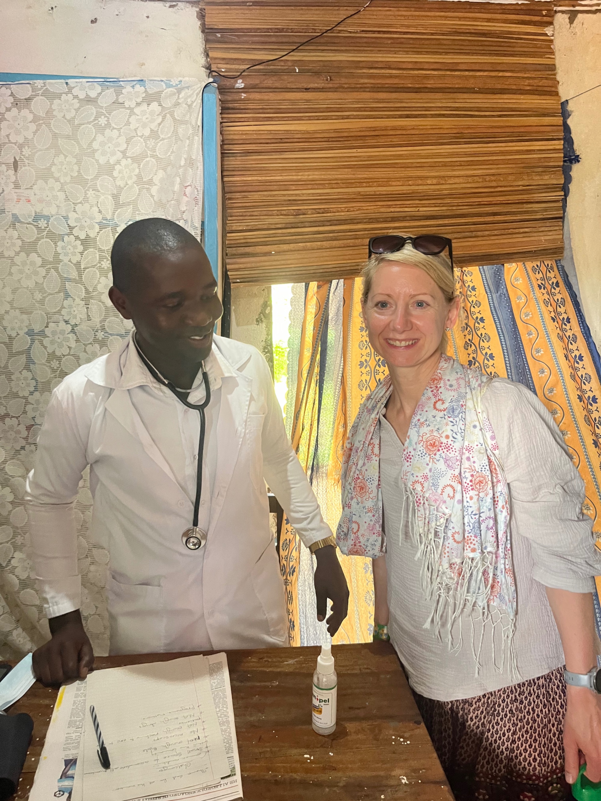Susanne standing with a local doctor in the small health centre in Muyembe, Uganda
